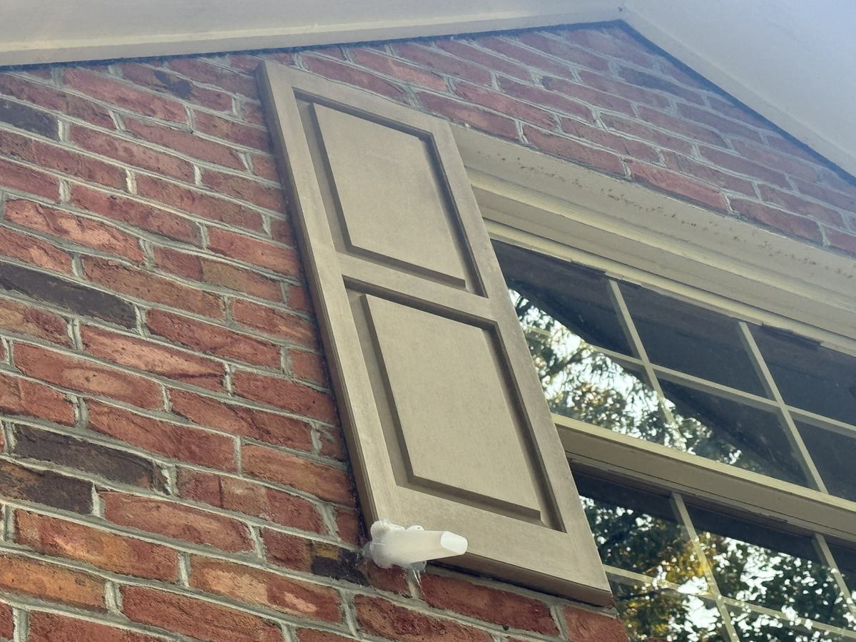 One-way bat exclusion device installed at the base of a shutter in Lenoir NC